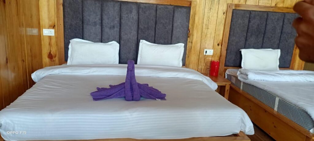 Wide scenic view of Mount Vista Resort surrounded by lush green hills